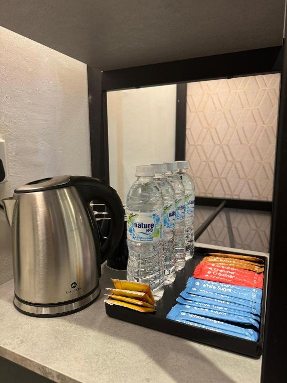 Kuchyň nebo kuchyňský kout v ubytování Le'genda Hotel