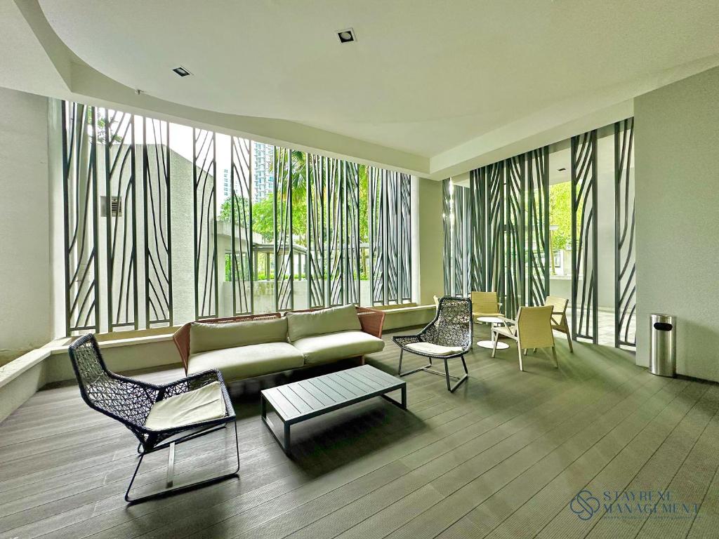 Posezení v ubytování Teega Residence By Stayrene