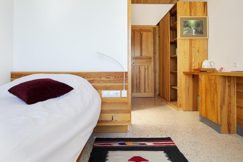 Postel nebo postele na pokoji v ubytování Hotel Gracanica