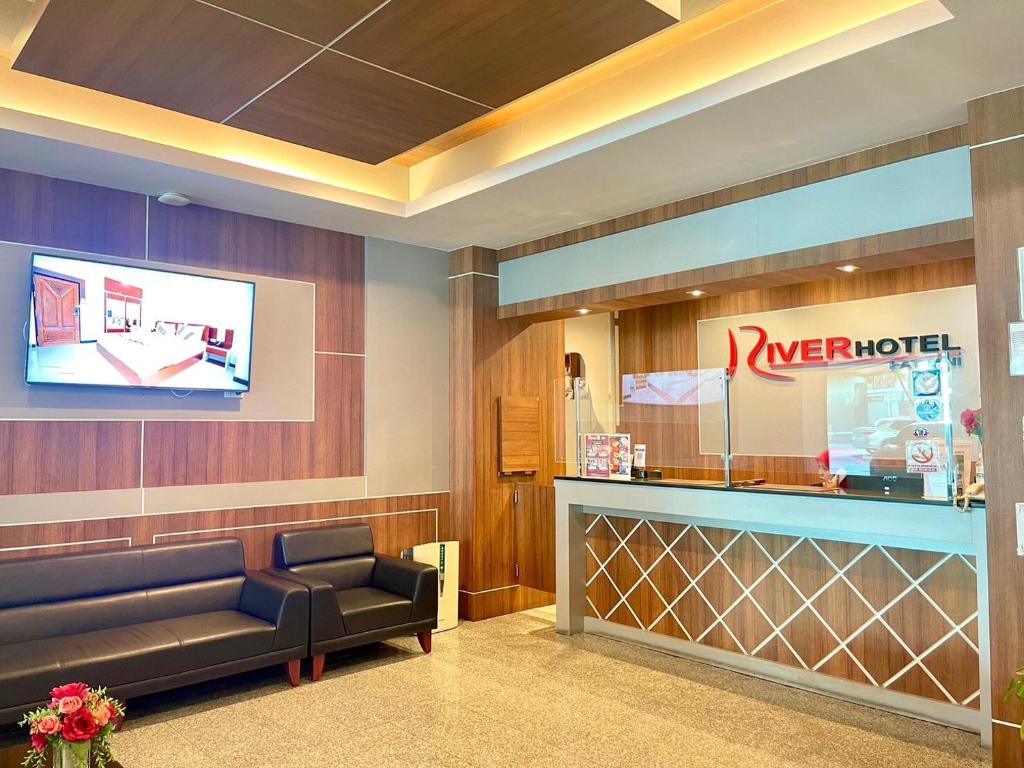 TV a/nebo společenská místnost v ubytování River Hotel Pattani