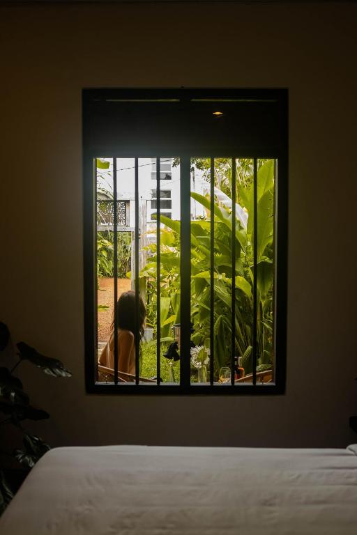 Postel nebo postele na pokoji v ubytování Banana Bunks Mirissa