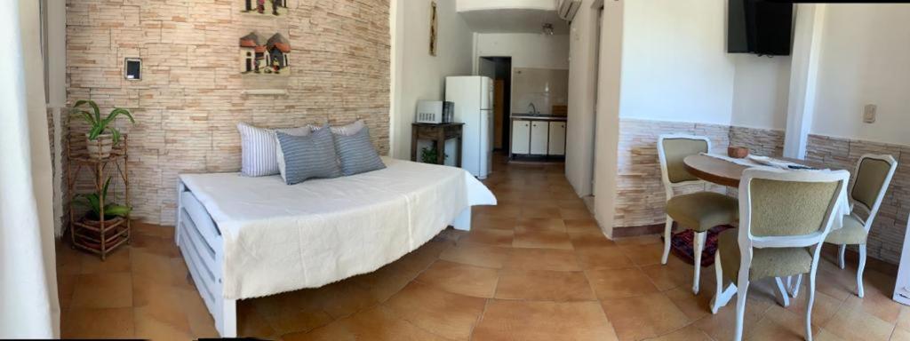 Ένα ή περισσότερα κρεβάτια σε δωμάτιο στο CASA CANGAS