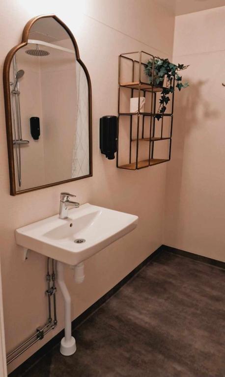 Koupelna v ubytování Edsbyns Hotell