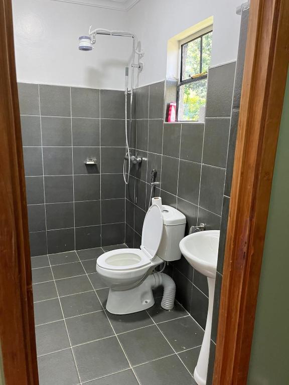 Koupelna v ubytování Koselig Homes