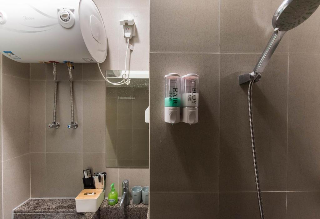 Koupelna v ubytování WESU Weisu Executive Apartment Shenzhen Shenda Metro Store