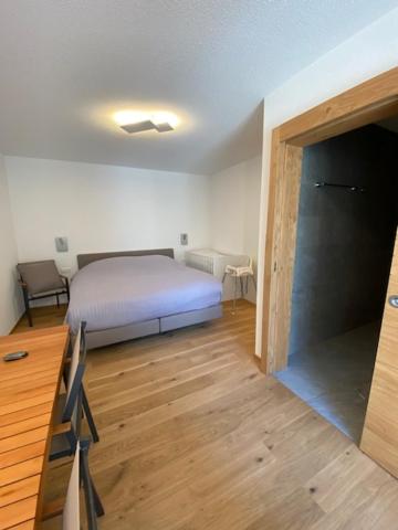 Postel nebo postele na pokoji v ubytování Berghof