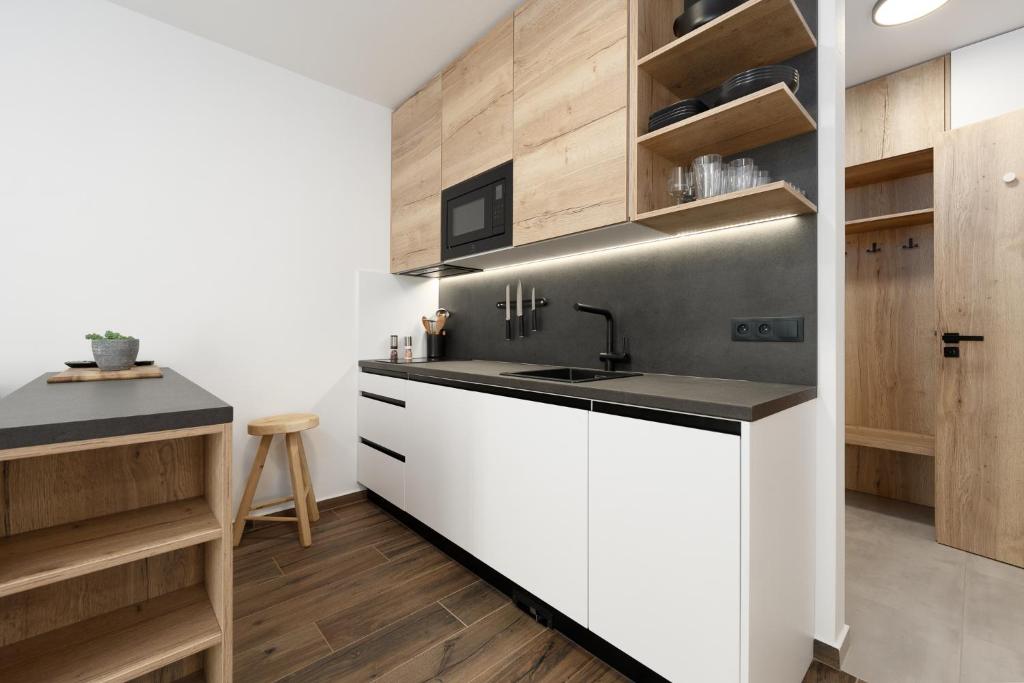 Kuchyň nebo kuchyňský kout v ubytování Apartmány HAFERKY Velké Karlovice