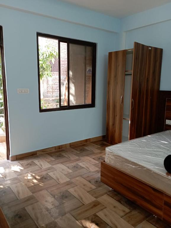 Postel nebo postele na pokoji v ubytování Crescent Moon Homestay