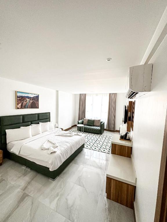 Postel nebo postele na pokoji v ubytování Hotel Sand View