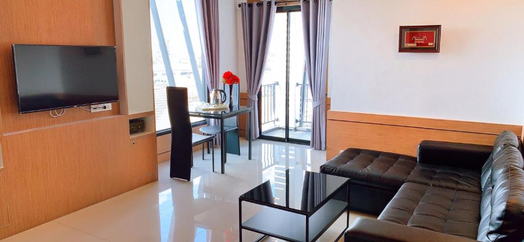 TV a/nebo společenská místnost v ubytování River Hotel Pattani