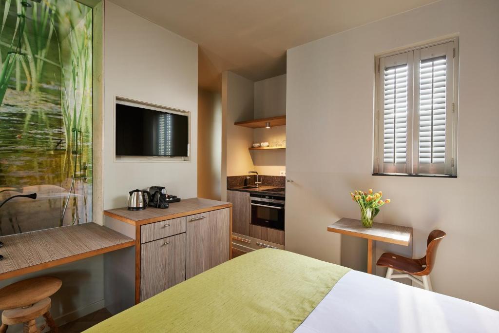 Kuchyň nebo kuchyňský kout v ubytování Hotel Miss Blanche