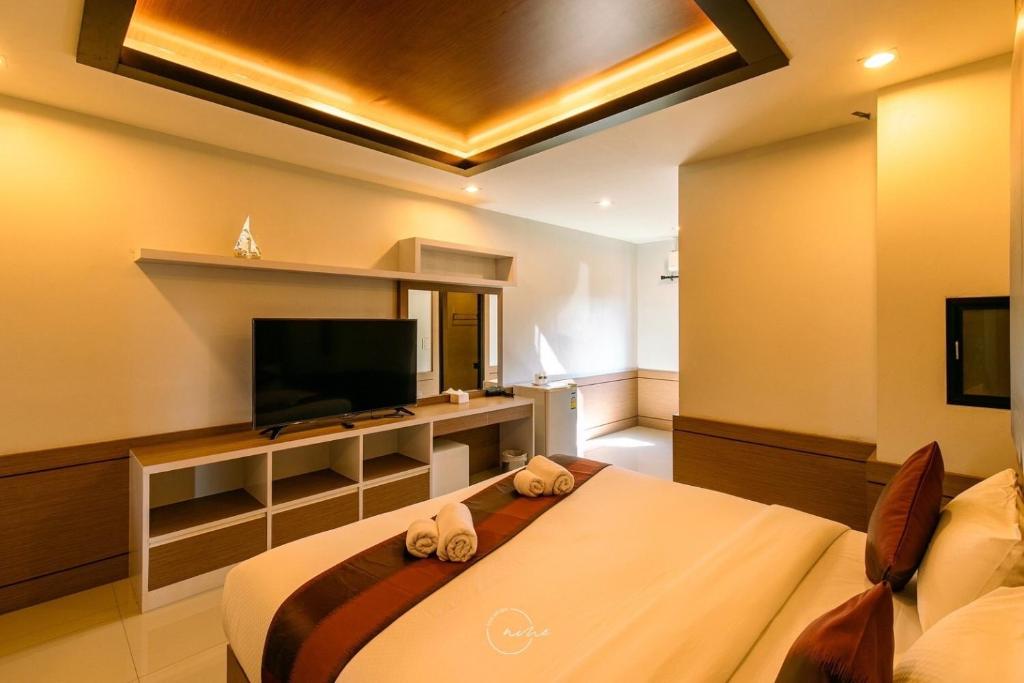TV a/nebo společenská místnost v ubytování River Hotel Pattani