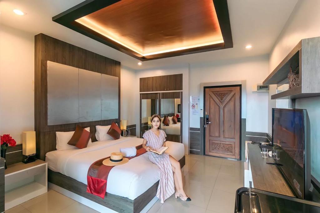TV a/nebo společenská místnost v ubytování River Hotel Pattani