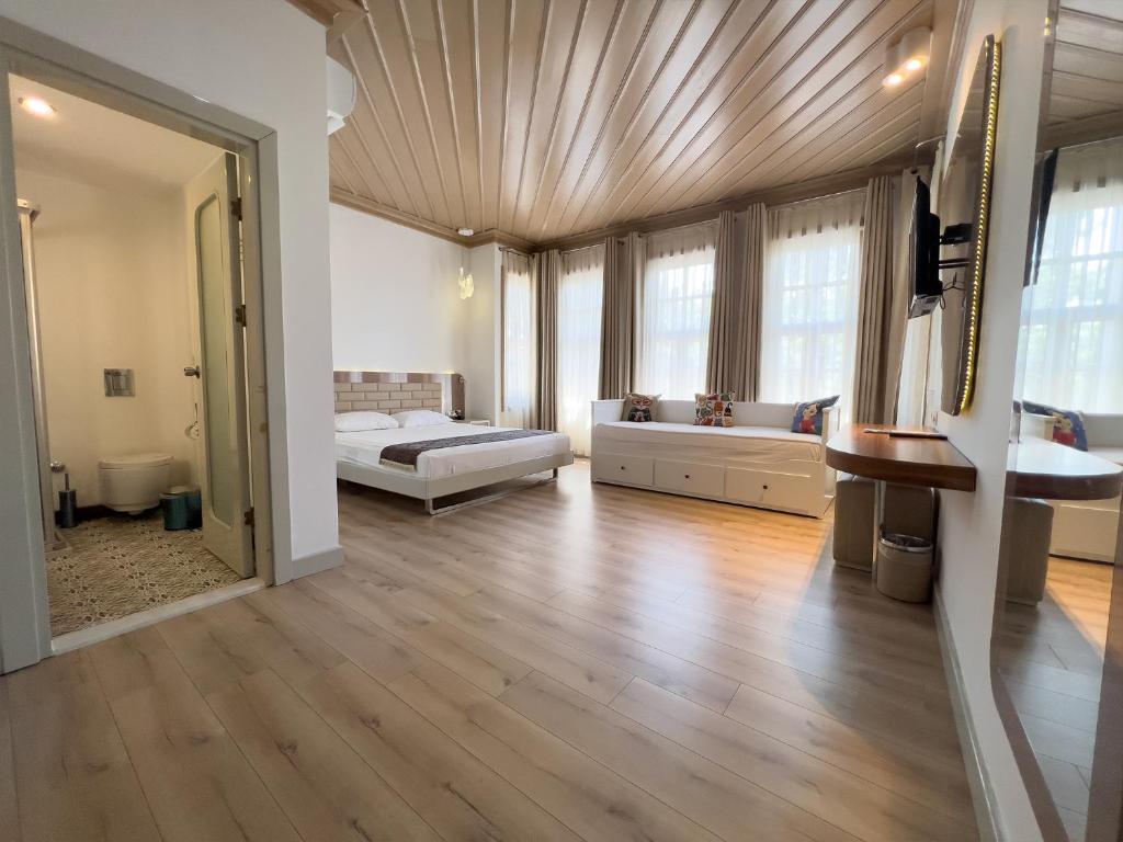 Кровать или кровати в номере Puding Hotel