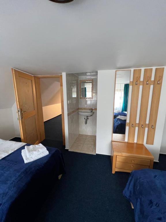Postel nebo postele na pokoji v ubytování 7Rooms