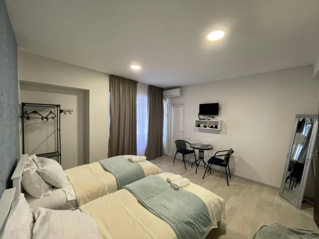Llit o llits en una habitació de Guest House in Old Tbilisi