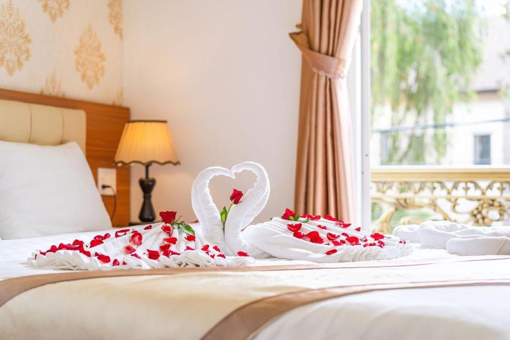 Giường trong phòng chung tại Villa Hoa Ly Đà Lạt