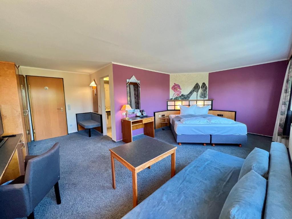 Postel nebo postele na pokoji v ubytování Hotel Residenz