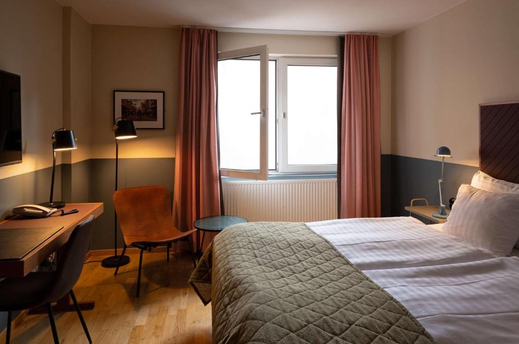 Postel nebo postele na pokoji v ubytování Best Western Plus Hotel Noble House