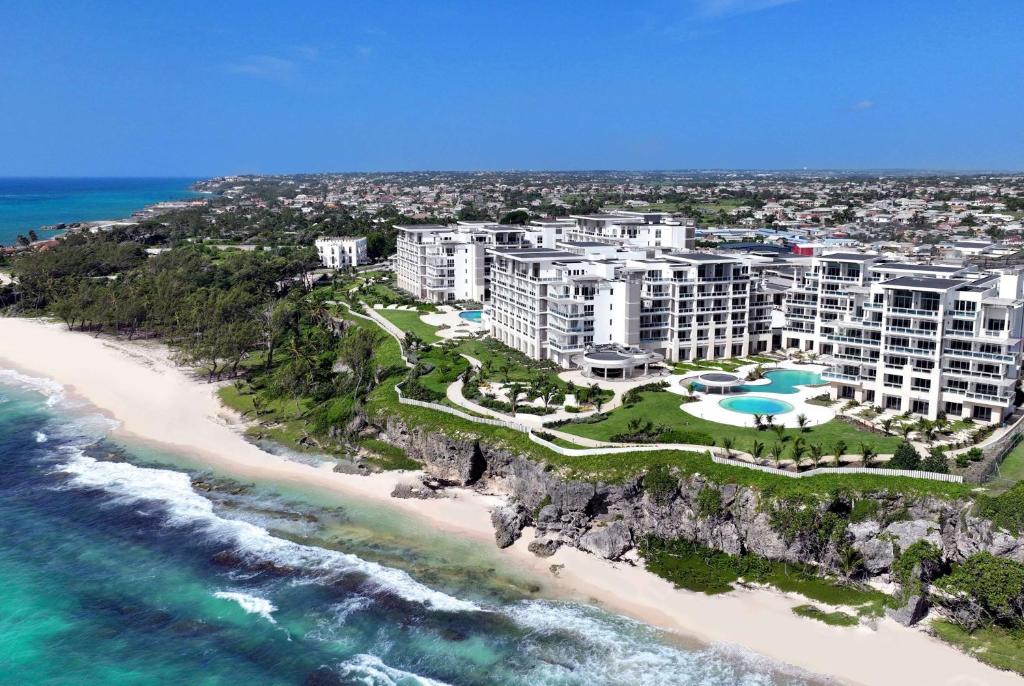 an aerial view of a resort on the beach at Wyndham Grand Barbados Sam Lords Castle All Inclusive Resort in Saint Philip