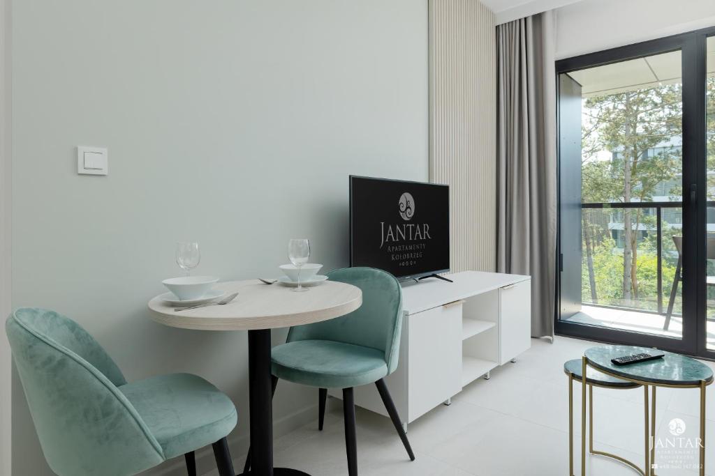 Televízia a/alebo spoločenská miestnosť v ubytovaní Shellter Apartments 117 Ł - by Jantar Apartamenty