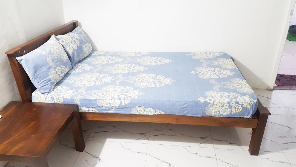 Postel nebo postele na pokoji v ubytování Beehive Colombo