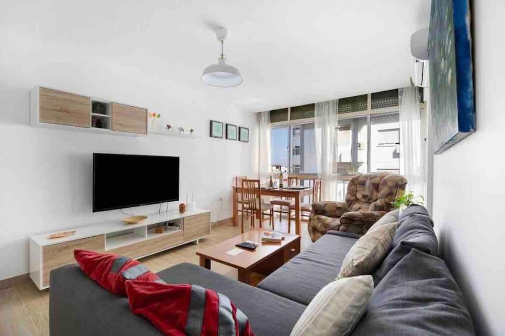 Televízia a/alebo spoločenská miestnosť v ubytovaní La casa de la playa