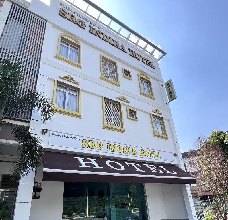 a facade of the sig india hotel at Srg Indira Hotel in Gelang Patah