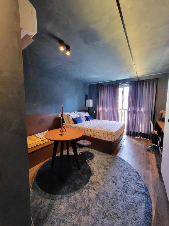 Postel nebo postele na pokoji v ubytování Condomínio GO24