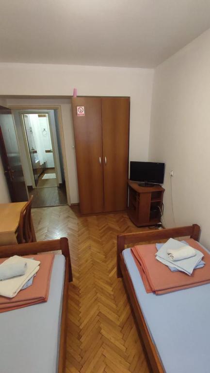 Postel nebo postele na pokoji v ubytování Jasna1