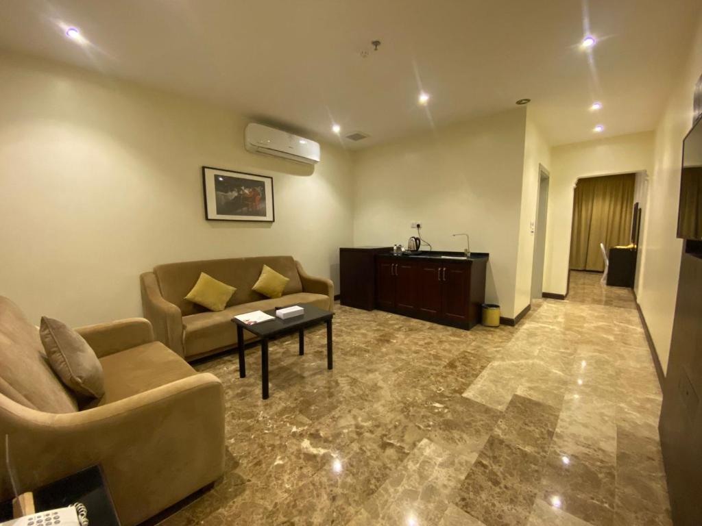 Posezení v ubytování Rollins Hotel