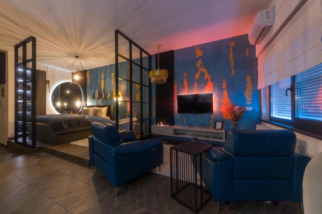 TV a/nebo společenská místnost v ubytování Stari Toranj IV studio apartman