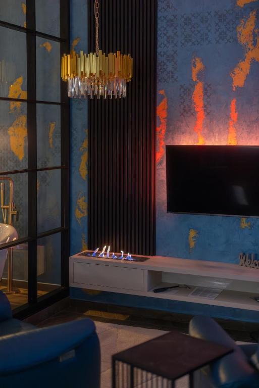 TV a/nebo společenská místnost v ubytování Stari Toranj IV studio apartman