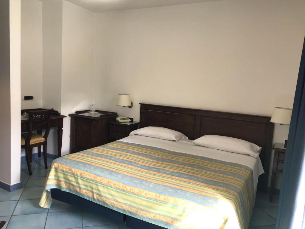 Postel nebo postele na pokoji v ubytování Villa Ciccio