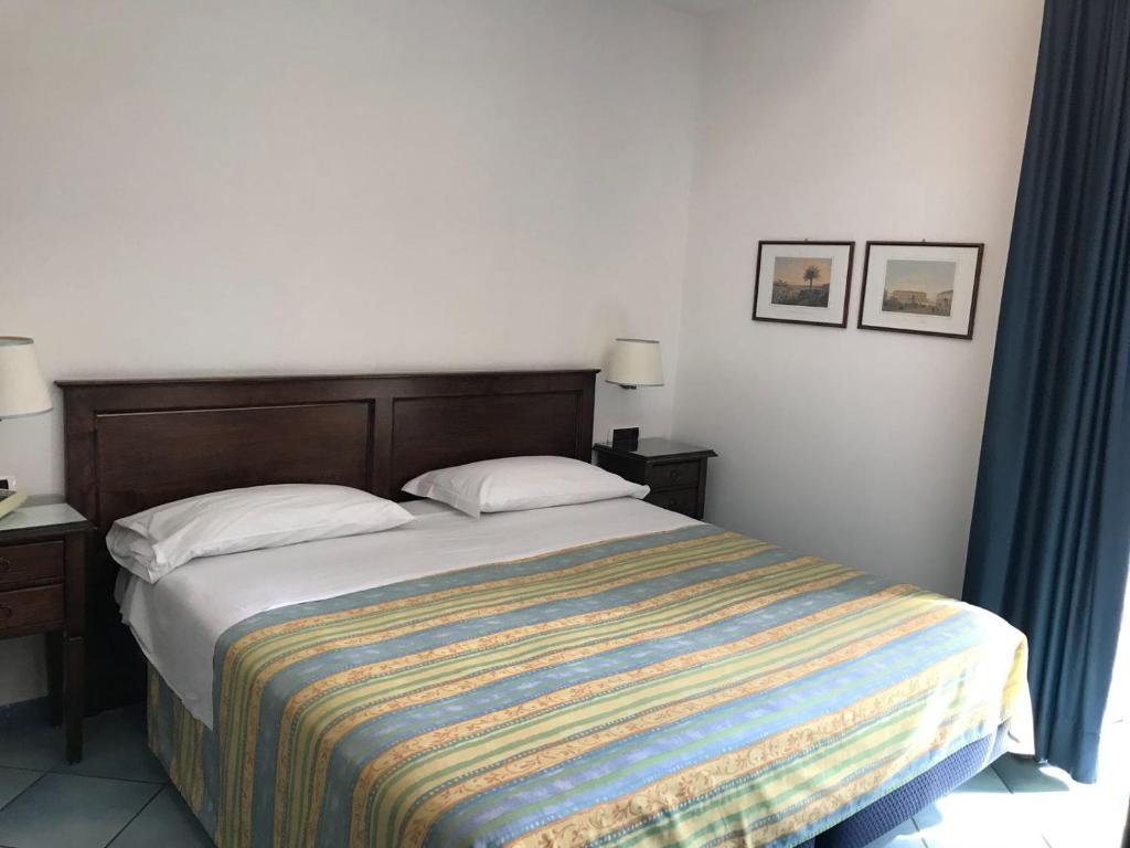 Postel nebo postele na pokoji v ubytování Villa Ciccio