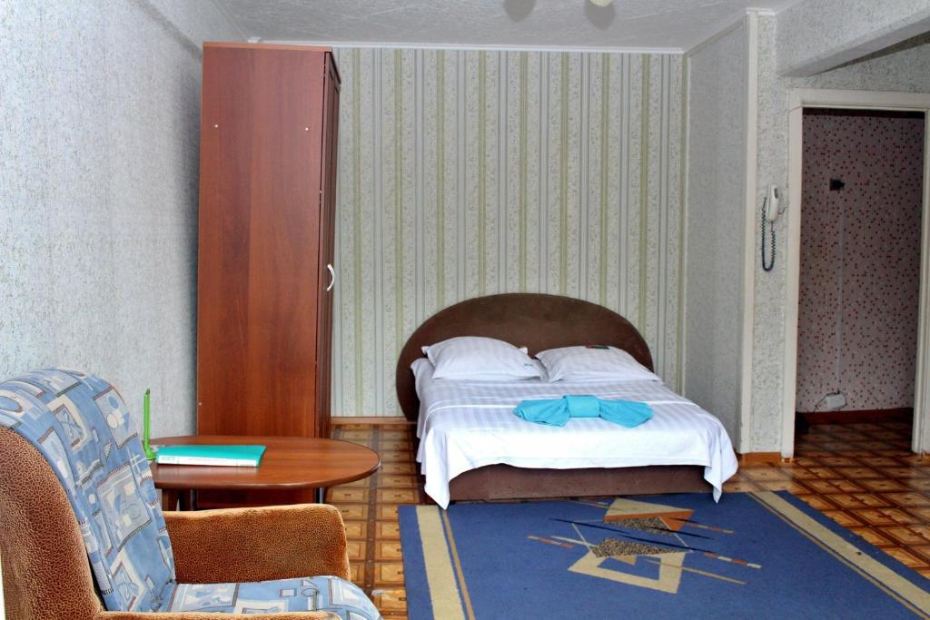 เตียงในห้องที่ Жасмин