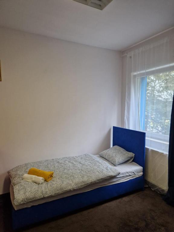 Postel nebo postele na pokoji v ubytování NOCLEGI WOJTEK
