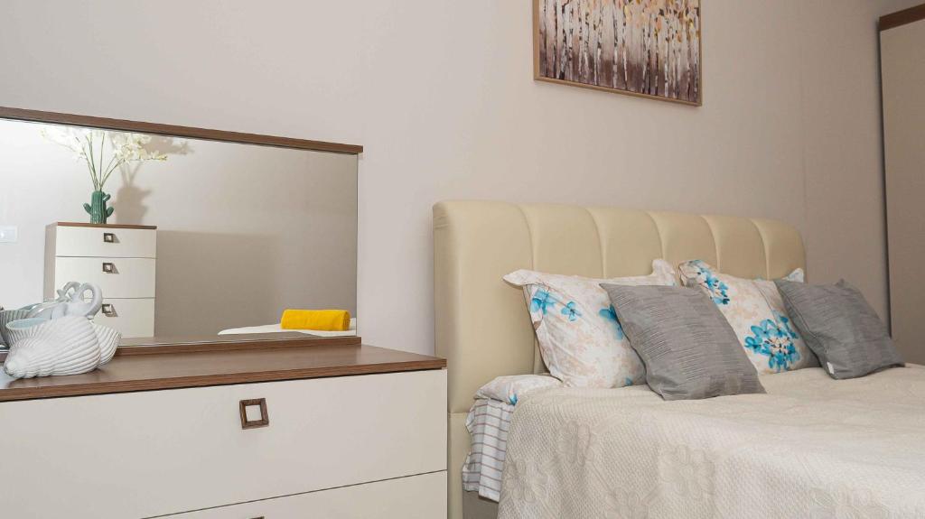 En eller flere senge i et værelse på Burgas Residence 610