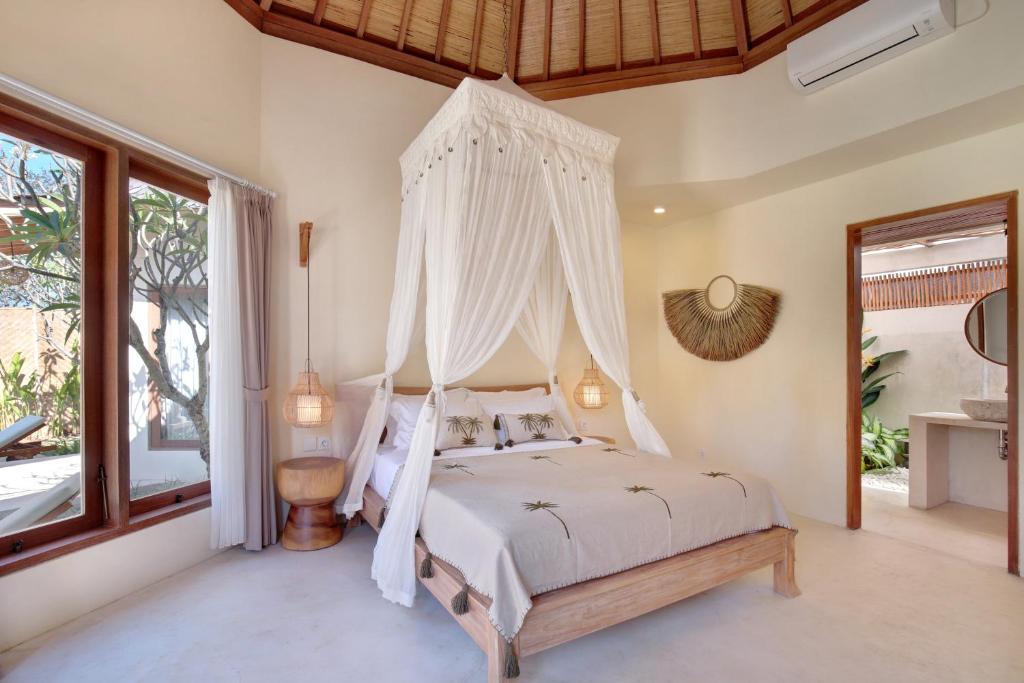 Postel nebo postele na pokoji v ubytování Aurora Wonderland