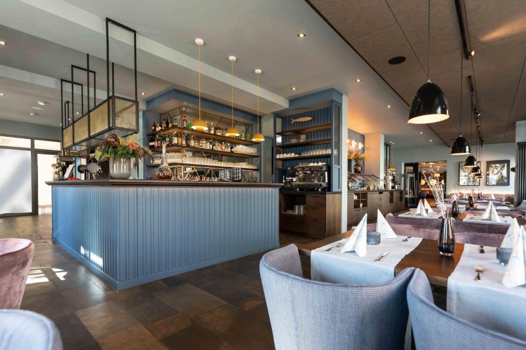 Lounge nebo bar v ubytování Hotel Friesenhof