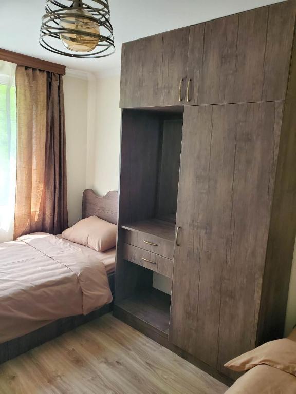 Postel nebo postele na pokoji v ubytování СУХУМИЯ