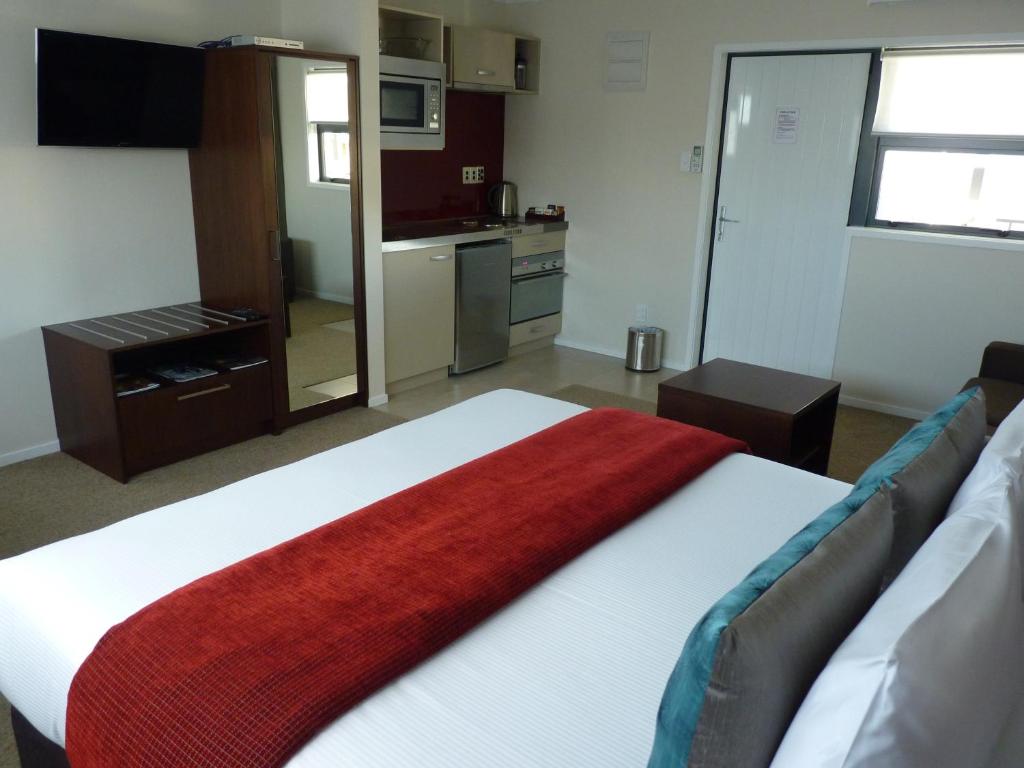 Postel nebo postele na pokoji v ubytování Astra Motor Lodge