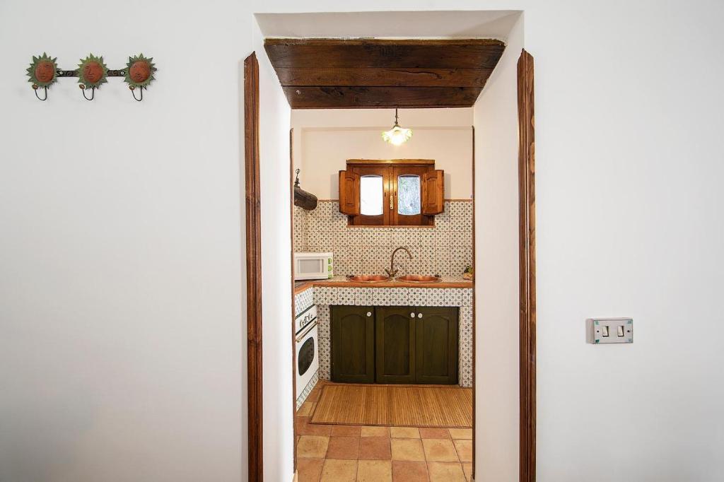 Kuchyň nebo kuchyňský kout v ubytování Borgo di Conca