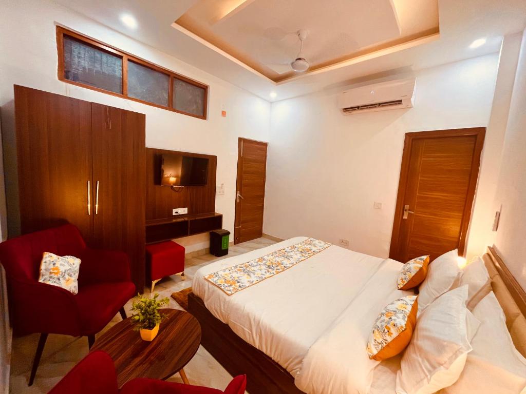 Postel nebo postele na pokoji v ubytování Triple Residency, Top Rated & Most Awarded Property in Tricity