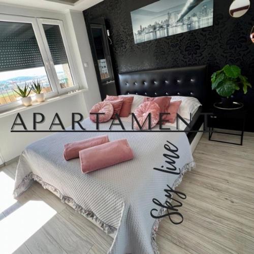Posteľ alebo postele v izbe v ubytovaní Spółdzielcza 22 Apartament Sky Line