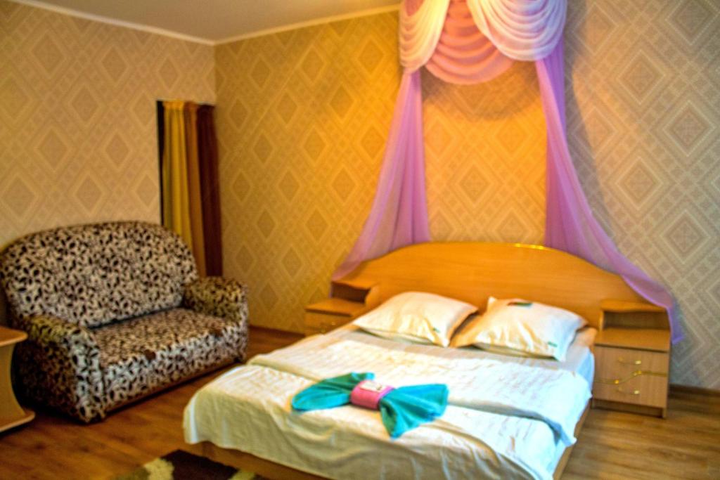 เตียงในห้องที่ Империал