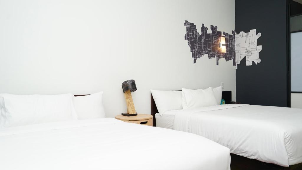 Postel nebo postele na pokoji v ubytování Aloft Ponce Hotel & Casino