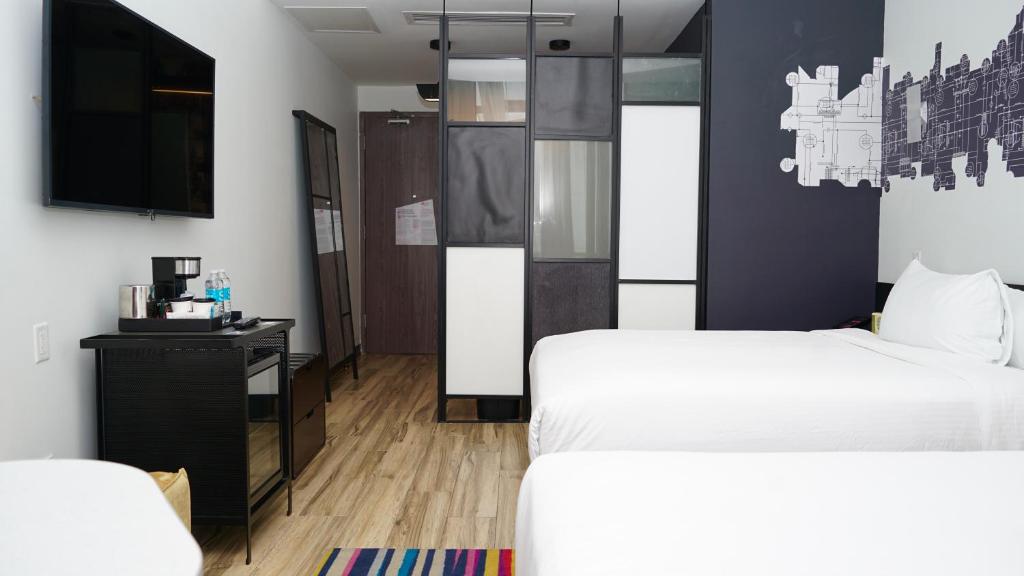 Postel nebo postele na pokoji v ubytování Aloft Ponce Hotel & Casino
