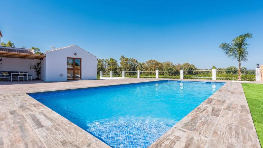 Bazén v ubytování Villa Los Abuelos Cartama by Ruralidays nebo v jeho okolí