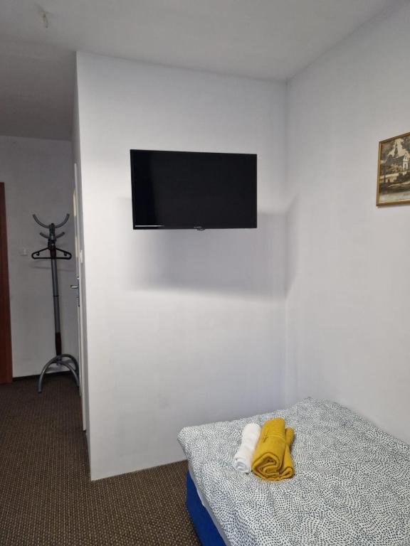 Postel nebo postele na pokoji v ubytování NOCLEGI WOJTEK